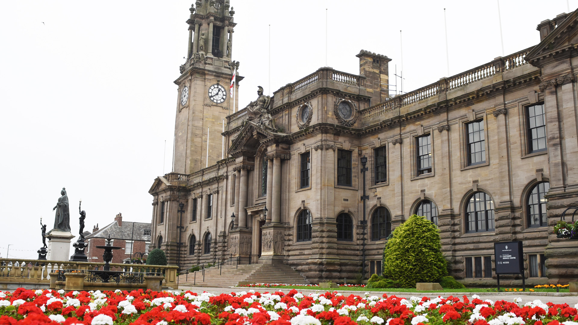 The outside of South Shields Town Hall, showing flowers in bloom