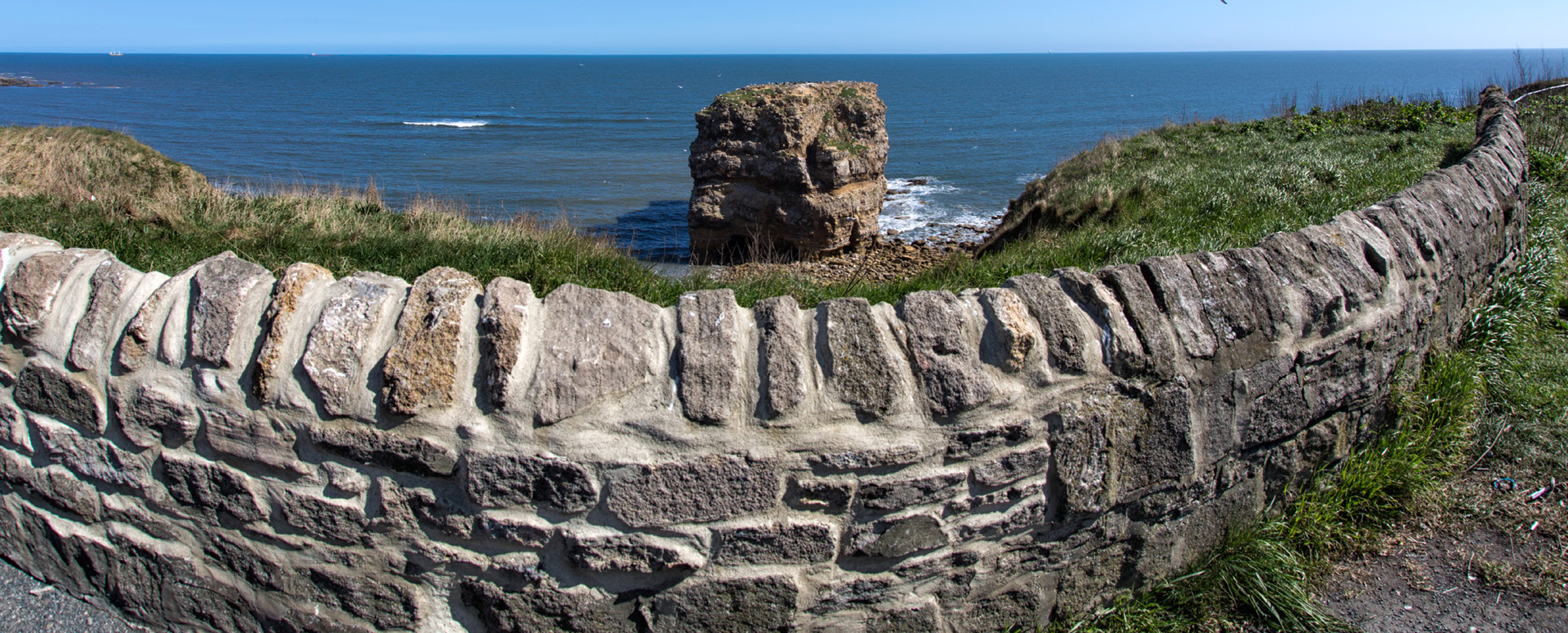 A stone wall at the beach front