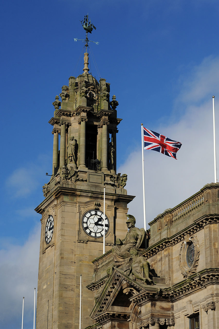 South Shields Town Hall clock tower with a union flag flying