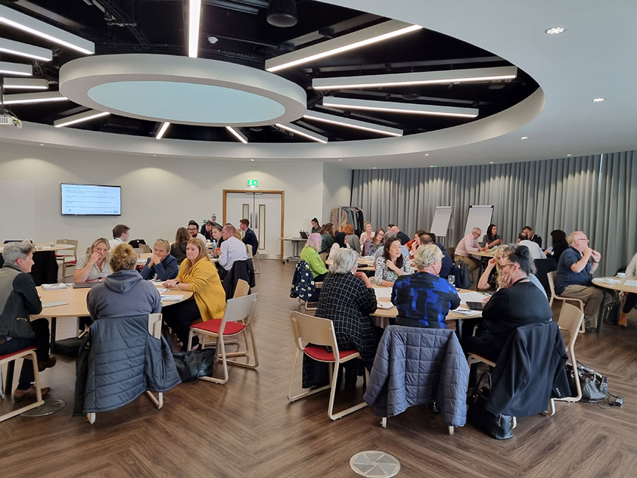 Groups of people at tables